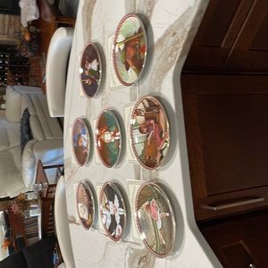 Norman Rockwell plates comprising a set (8) of Rockwells Studies of Girlhood